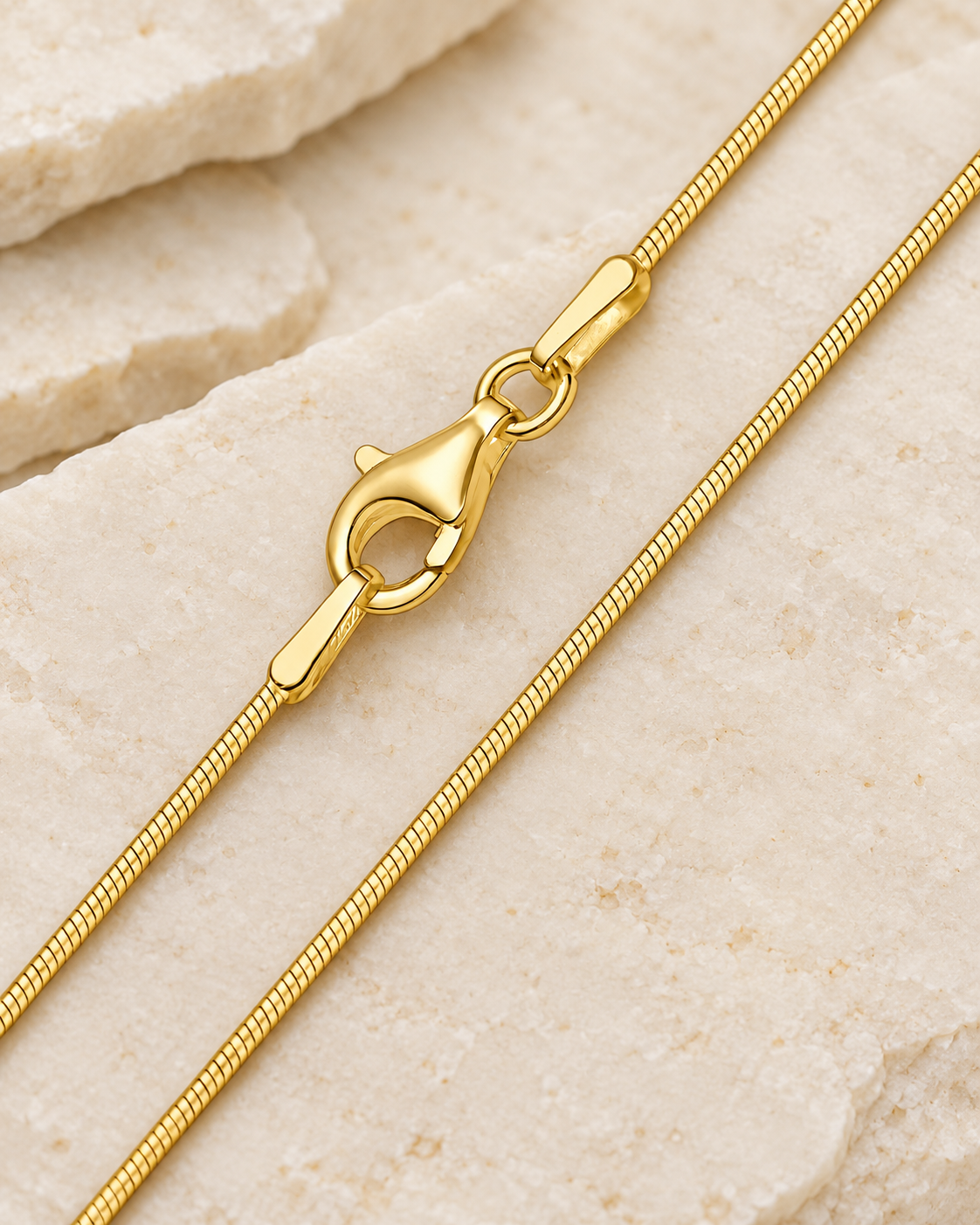 20 inch gold stainless steel snake chain with lobster clasp.