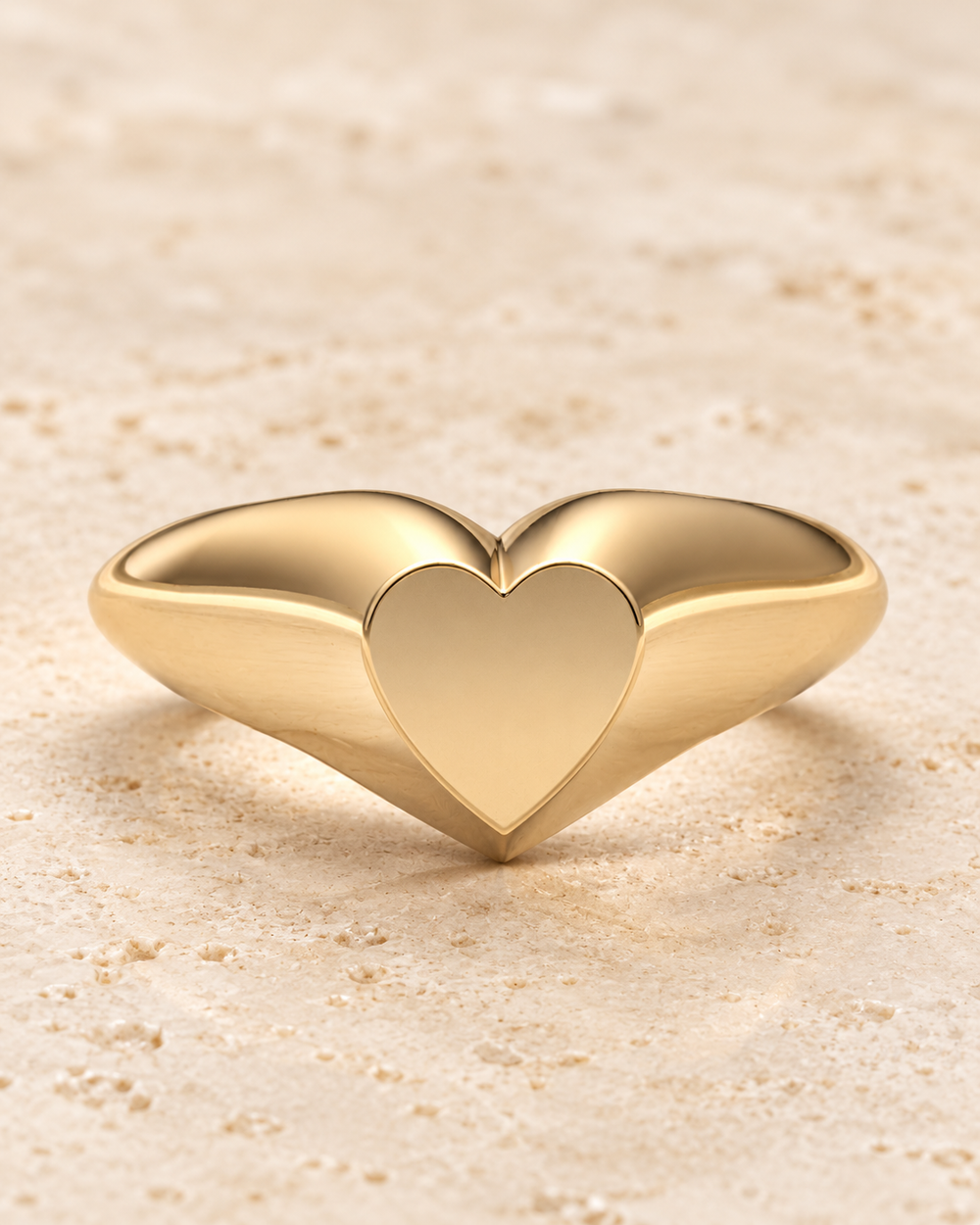 14K gold heart signet Forever Sealed ring on cream stone