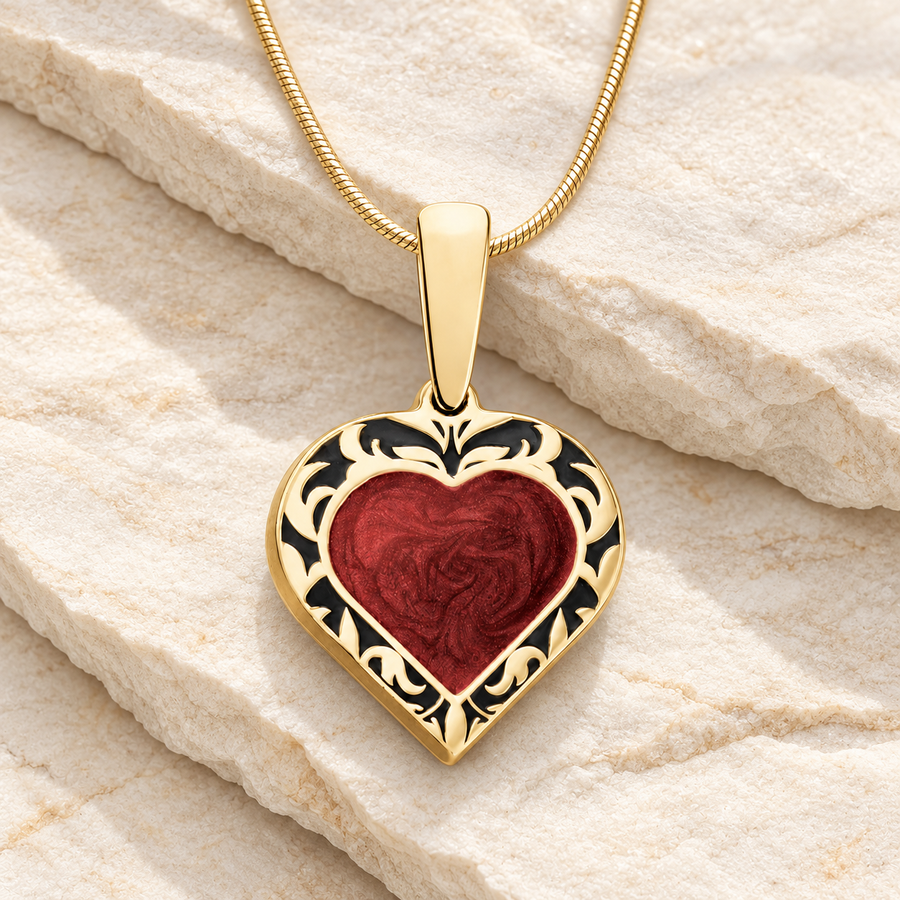 Gold ash heart necklace with red resin on white slate