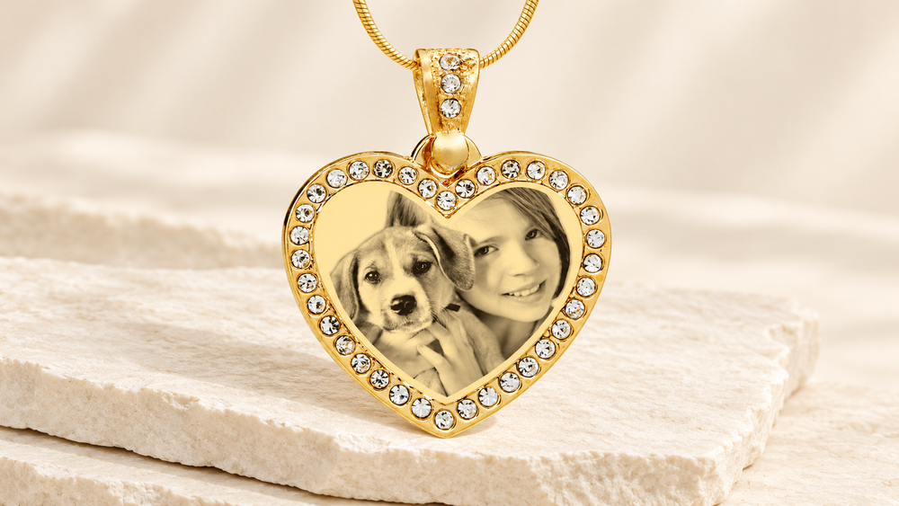 Gold gem heart photo keepsake with an engraved girl and puppy portrait