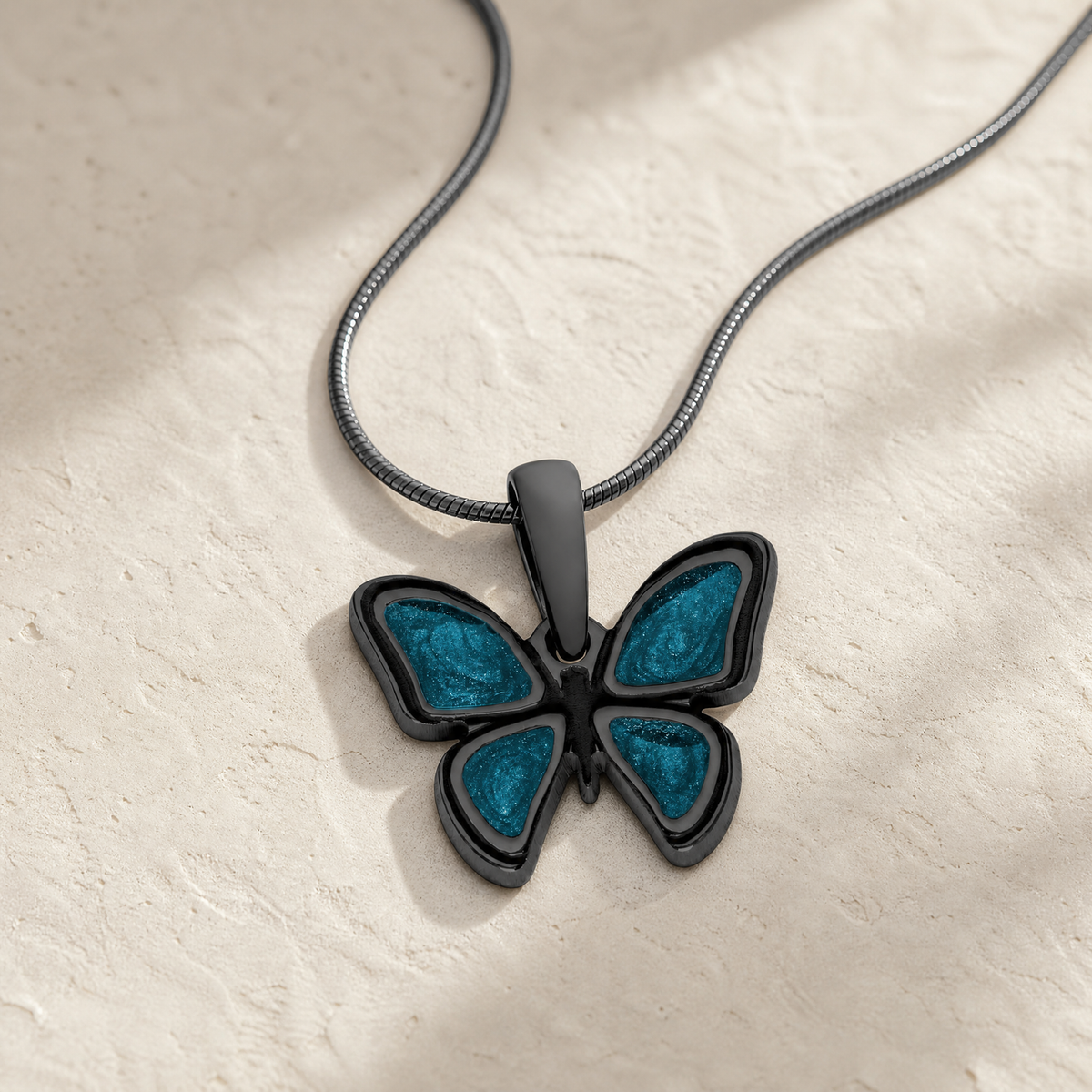 Lovable Butterfly Black Finish with Aqua Resin Ash Resin Jewelry